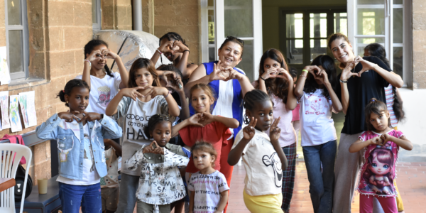 Refugees at a migrant center in Lebanon. Read stories from JRS staff and refugees worldwide.